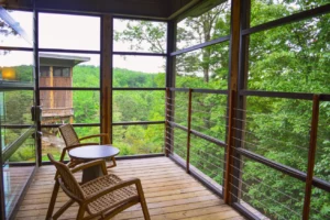cabin deck, surrounded by nature .