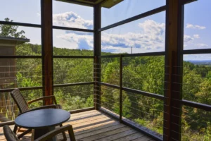 cabin deck, surrounded by trees 3.